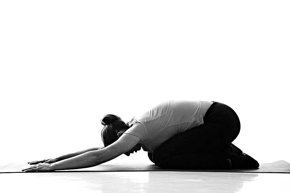 Woman Practicing Child Pose Yoga Asana Stock Photo by ©rognar 3831397