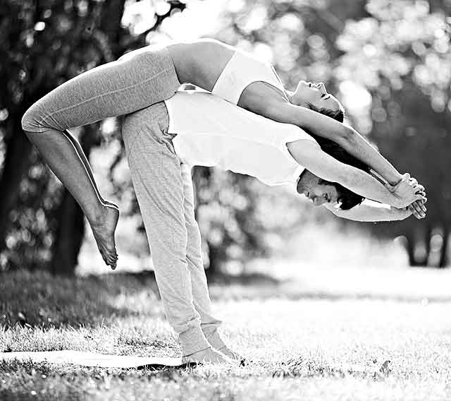 Couple of young sporty people practicing yoga lesson with partner, man and  woman in yogi exercise, arm balance pose, working out, indoor full length,  studio. Wellbeing, wellness concept Photos | Adobe Stock